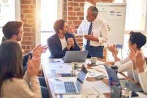 happy staff in meeting